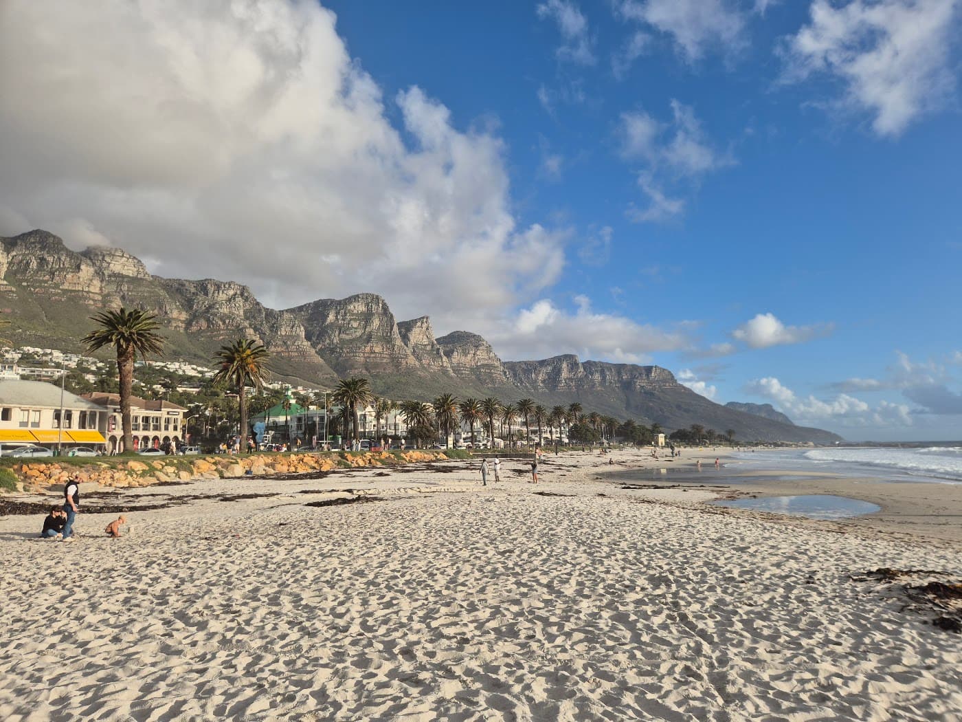 Camps Bay beach with the Twelve Apostles mountain range behind