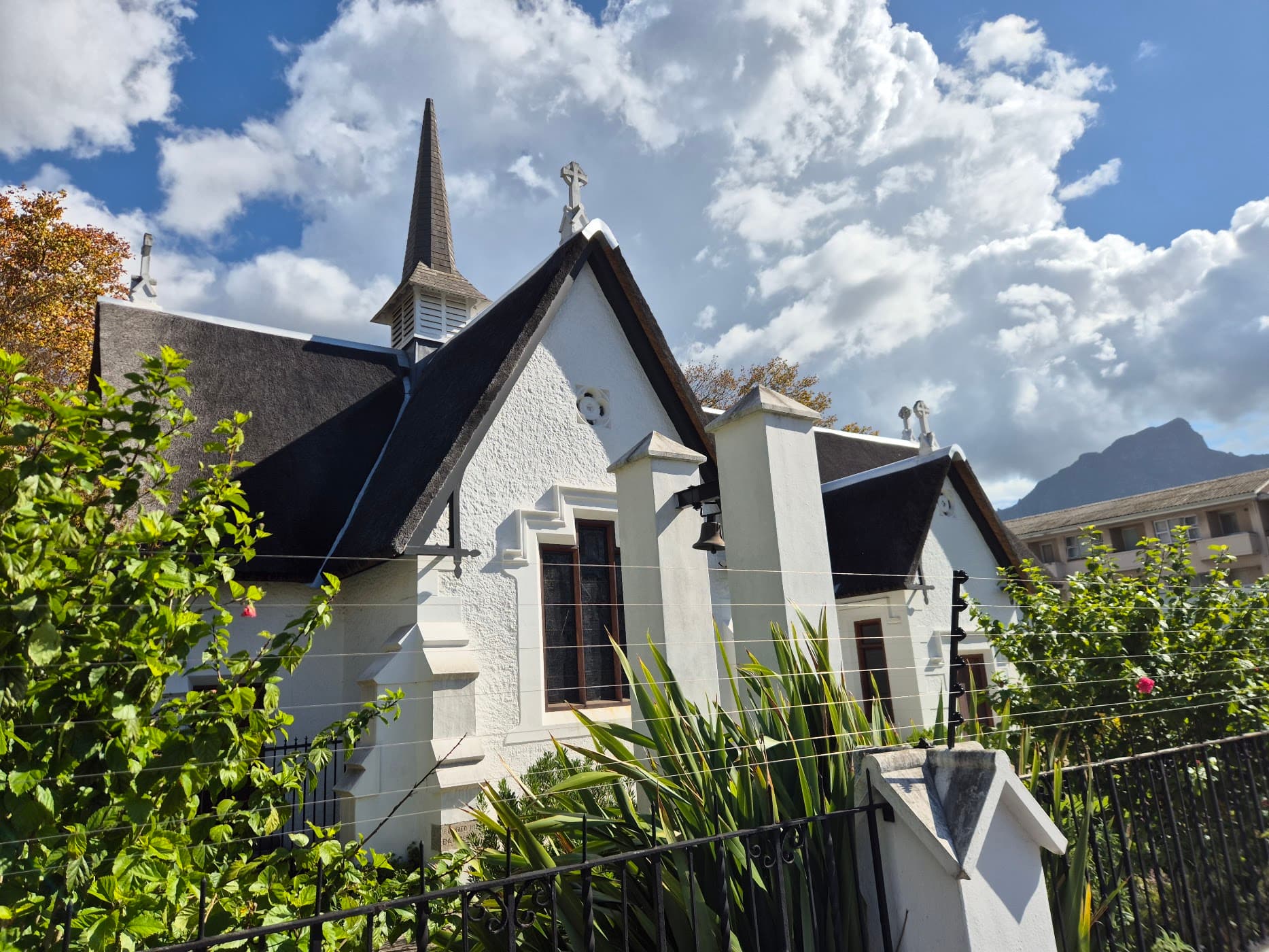A close-up view of a white church with a steeple