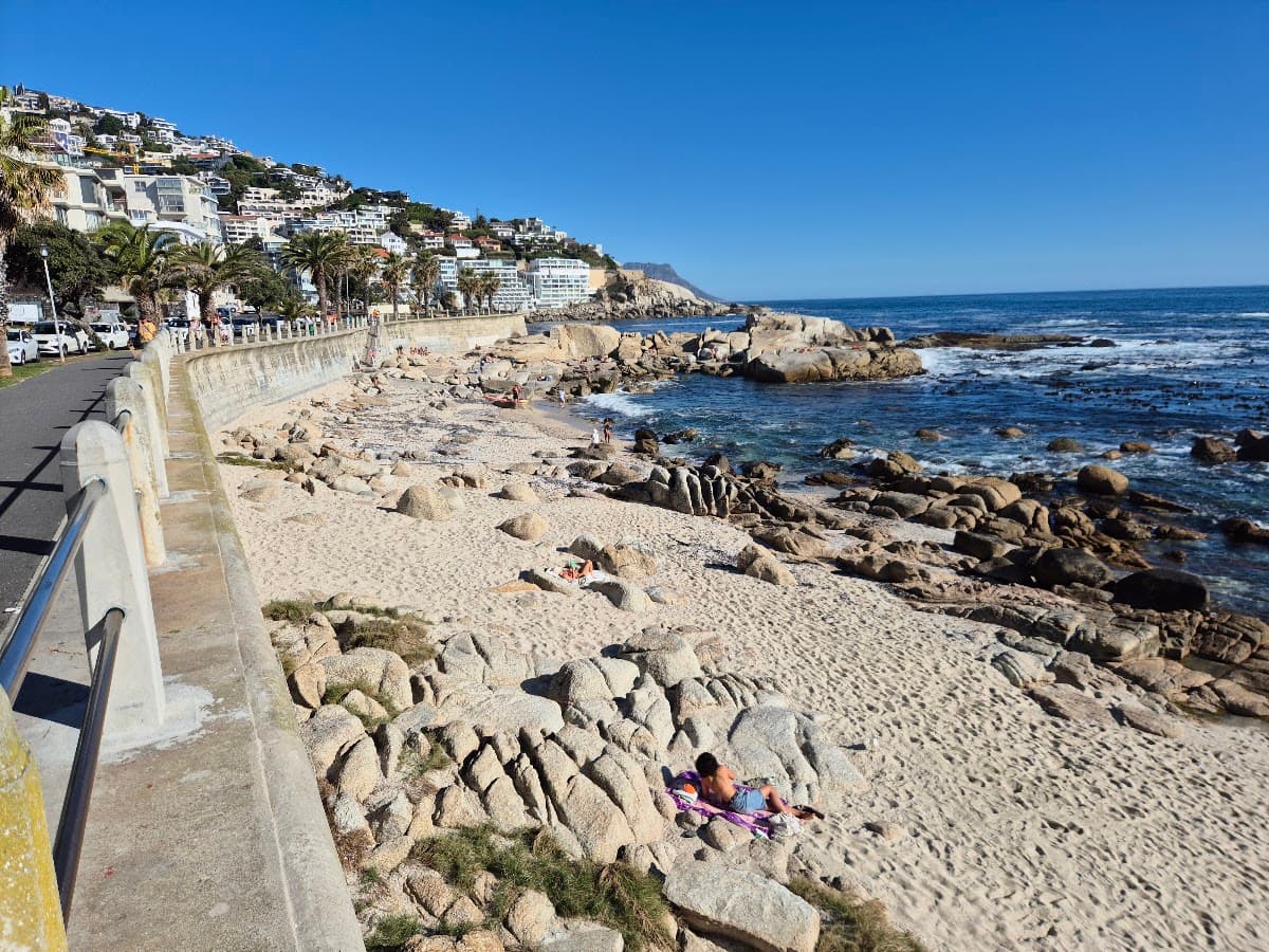 A rocky coastal walkway along the Sea Point promenade