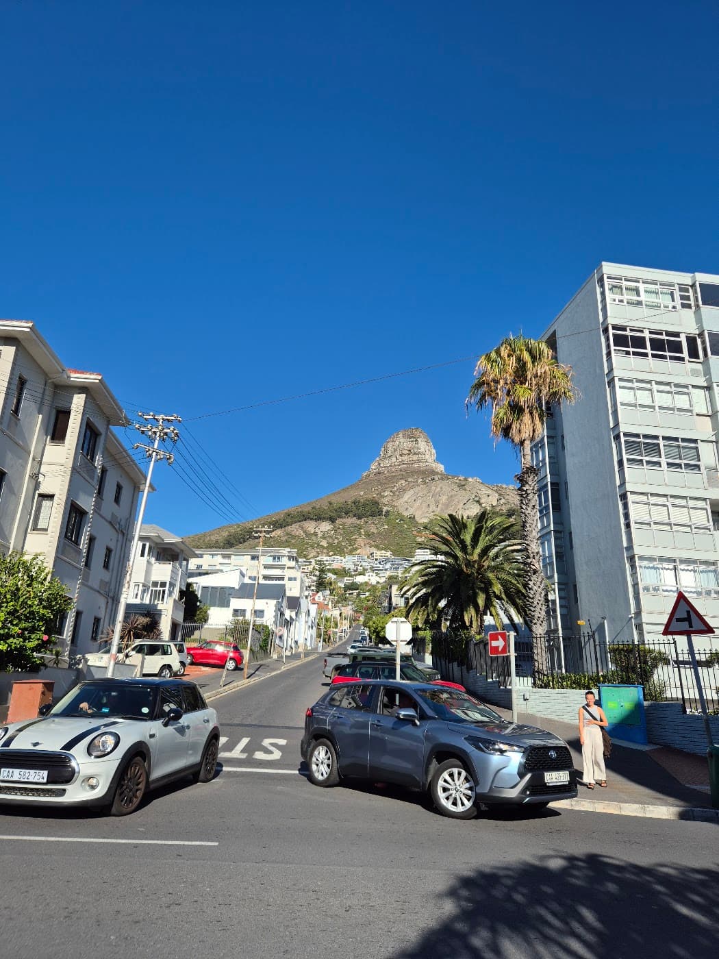 A street near Camps Bay with Lion's Head in the background